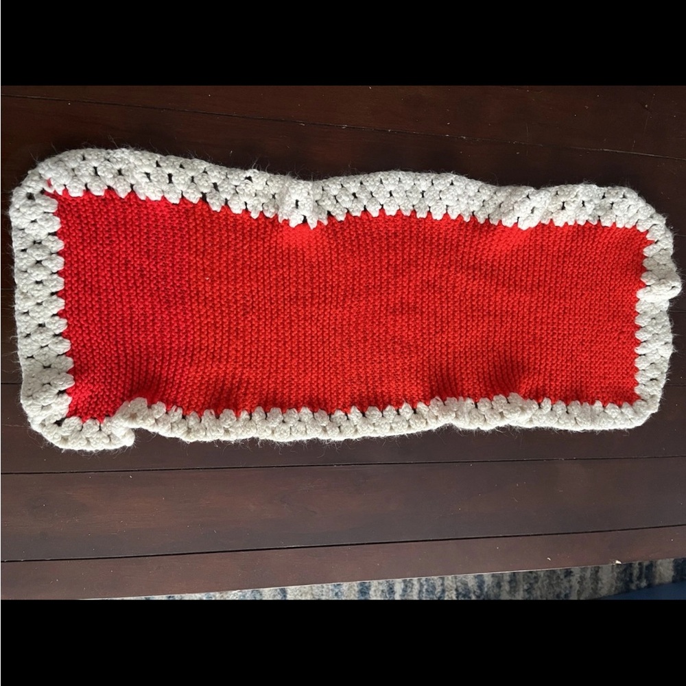 Red and white rectangle shaped hand made crocheted doily--35x14”